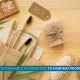 Eco-friendly swaps like bamboo toothbrush, steel bottle, and cloth bag replacing single-use products