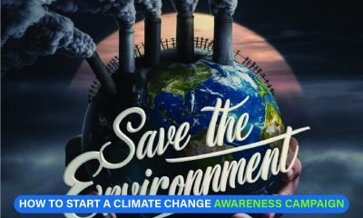 Community rally with banners promoting climate change awareness and sustainable action initiatives